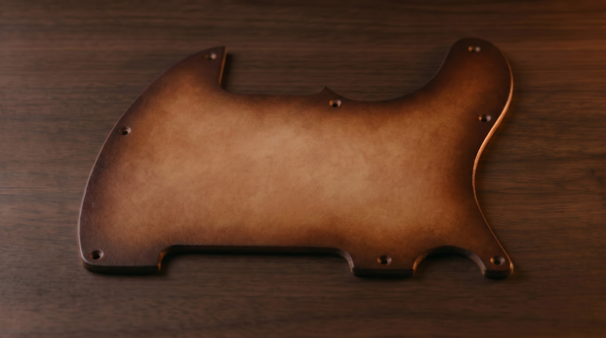 Hand-dyed veg-tanned leather sunburst for The Lucio, color and edge-treatment reference before final pickup routing.